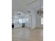 Open living room features white cabinets, stainless appliances, and hardwood floors at 1852 E Viking Rd, Las Vegas, NV 89169
