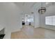 Open-concept living area with wood floors, fireplace, and access to the updated kitchen at 1852 E Viking Rd, Las Vegas, NV 89169
