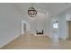 Bright living room features a fireplace, hardwood floors, and stylish lighting fixture at 1852 E Viking Rd, Las Vegas, NV 89169