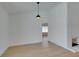 Bright living room features modern lighting fixtures and hardwood floors at 1852 E Viking Rd, Las Vegas, NV 89169