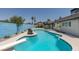 Large pool with diving board and mature landscaping at 1852 E Viking Rd, Las Vegas, NV 89169