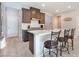 Modern kitchen features a large island, stainless steel appliances, and ample cabinet space at 19 Cresta Villa Ct, Henderson, NV 89011