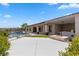 Spacious backyard featuring a pool, patio, outdoor kitchen, and fire pit perfect for relaxing and entertaining at 1950 Colvin Run Dr, Henderson, NV 89052