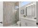 Well-lit bathroom with a glass-enclosed shower, modern vanity, and stylish fixtures, designed for comfort and style at 1950 Colvin Run Dr, Henderson, NV 89052