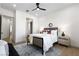 Tastefully decorated bedroom features a ceiling fan, neutral tones, and ample space at 1950 Colvin Run Dr, Henderson, NV 89052