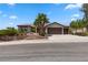 Stunning single-story home with a three-car garage, desert landscaping and an inviting entrance at 1950 Colvin Run Dr, Henderson, NV 89052