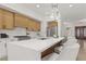 Contemporary kitchen with a large island, stylish pendant lighting and stainless steel appliances at 1950 Colvin Run Dr, Henderson, NV 89052