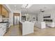 Modern kitchen with stainless steel appliances, an island with seating, and an open layout perfect for entertaining at 1950 Colvin Run Dr, Henderson, NV 89052