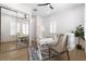 Bright office space features shuttered windows, a ceiling fan, and a mirrored closet at 1950 Colvin Run Dr, Henderson, NV 89052