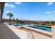Sparkling pool and spa with lush landscaping and scenic views create a serene outdoor oasis at 1950 Colvin Run Dr, Henderson, NV 89052