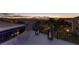 Enjoy city views from this outdoor deck with lounge chair and lanterns at 1999 Oliver Springs St, Henderson, NV 89052