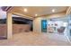 Large covered patio with pavers, fire pit, sliding glass door to living area, block wall for privacy at 2069 Alto Vista Dr, Henderson, NV 89052