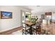 Open dining area seamlessly connecting to the living room and kitchen, creating an ideal space for entertaining at 2069 Alto Vista Dr, Henderson, NV 89052