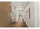 Elegant home entryway with hardwood floors, recessed lighting, and modern artwork on display at 2069 Alto Vista Dr, Henderson, NV 89052