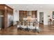 Modern kitchen with granite countertops, stainless steel appliances, and bar stool seating at 2069 Alto Vista Dr, Henderson, NV 89052