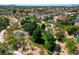 Aerial view of community park featuring playground, walking paths, landscaping, and green spaces at 2113 Scarlet Rose Dr, Las Vegas, NV 89134