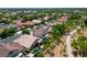 Expansive aerial view showcases the property's location within a community, highlighting landscape and nearby walkway at 2113 Scarlet Rose Dr, Las Vegas, NV 89134