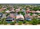 Wide aerial perspective showcases the property within the neighborhood, including its proximity to nearby residences at 2113 Scarlet Rose Dr, Las Vegas, NV 89134