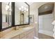 Well-lit bathroom with a large mirror, vanity, and a separate shower and tub area at 2113 Scarlet Rose Dr, Las Vegas, NV 89134