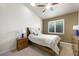 Inviting bedroom featuring vaulted ceiling, natural light, and neutral decor at 2113 Scarlet Rose Dr, Las Vegas, NV 89134