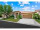 Charming single-story home featuring a well-manicured lawn and attached two-car garage at 2113 Scarlet Rose Dr, Las Vegas, NV 89134