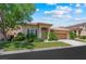 Charming single-story home featuring a well-manicured lawn and attached two-car garage at 2113 Scarlet Rose Dr, Las Vegas, NV 89134