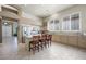 Open-concept kitchen features a large island, stainless steel appliances, and abundant natural light at 2113 Scarlet Rose Dr, Las Vegas, NV 89134