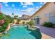 Inviting swimming pool with lush landscaping, creating a serene backyard oasis at 2113 Scarlet Rose Dr, Las Vegas, NV 89134