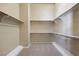 Spacious walk-in closet with built-in shelving and ample storage space at 2113 Scarlet Rose Dr, Las Vegas, NV 89134