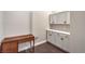 A well lit living space with wood floors, white walls, and cabinetry at 2158 High Mesa Dr, Henderson, NV 89012
