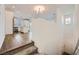 Open-concept living room with hardwood floors, bright lighting, and seamless flow into the kitchen at 25 Barbara Ln # 42, Las Vegas, NV 89183