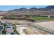 An aerial view of new construction homes in a community near mountain ranges at 2577 Tolmezzo St, Henderson, NV 89044
