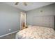 Cozy bedroom features neutral decor, plush carpet, and soft natural lighting at 2577 Tolmezzo St, Henderson, NV 89044