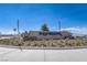 The community entrance sign surrounded by desert landscaping in a new neighborhood at 2577 Tolmezzo St, Henderson, NV 89044