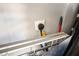 Garage equipped with an electric car charger and utility rack at 2577 Tolmezzo St, Henderson, NV 89044