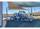 The modern community playground features play structures with slides, stairs, and sunshades in a safe play area at 2577 Tolmezzo St, Henderson, NV 89044