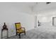 Open loft area features neutral carpet, recessed lighting, and adjacent doorways at 3320 Indian Moon Dr, Las Vegas, NV 89129