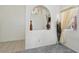 Bright entryway showcasing decorative niche, neutral decor, and tiled flooring detail at 3320 Indian Moon Dr, Las Vegas, NV 89129