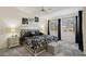 Serene main bedroom boasts plush carpet, ample natural light, and stylish decor at 3320 Indian Moon Dr, Las Vegas, NV 89129