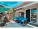 A relaxing patio featuring comfortable seating, shade, and a well-maintained outdoor living space at 3320 Indian Moon Dr, Las Vegas, NV 89129