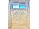 Shower stall with attractive tile details and a window for natural light at 3329 Hidden Ridge St, Las Vegas, NV 89129