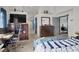 Spacious bedroom with large TV and comfortable seating area at 3389 Commendation Dr, Las Vegas, NV 89117