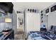 Stylish bedroom with modern decor, hats, and a large closet at 3389 Commendation Dr, Las Vegas, NV 89117