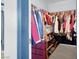 Walk-in closet with generous storage including shelves and hanging racks at 3389 Commendation Dr, Las Vegas, NV 89117