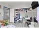 Multi-purpose room has ample lighting and storage shelves at 3389 Commendation Dr, Las Vegas, NV 89117