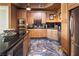 Well-equipped kitchen featuring stainless steel appliances, ample cabinetry, and sleek black countertops at 360 E Desert Inn Rd # 407, Las Vegas, NV 89109