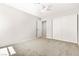 Neutral bedroom featuring carpet flooring and a closet at 4324 Peaceful Path Ct, North Las Vegas, NV 89032
