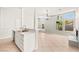 Kitchen with modern appliances open to dining and living area at 4324 Peaceful Path Ct, North Las Vegas, NV 89032
