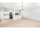 Open-concept kitchen and living area with dining area at 4324 Peaceful Path Ct, North Las Vegas, NV 89032