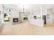 Open living space featuring a cozy fireplace and open floorplan at 4324 Peaceful Path Ct, North Las Vegas, NV 89032